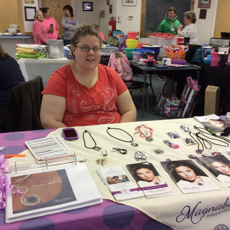 Nichole Hannan, a brand-new consultant for Mahnabilities, set up for her first show ever as part of the extravaganza. KATRINA CLARK/Boothbay Register