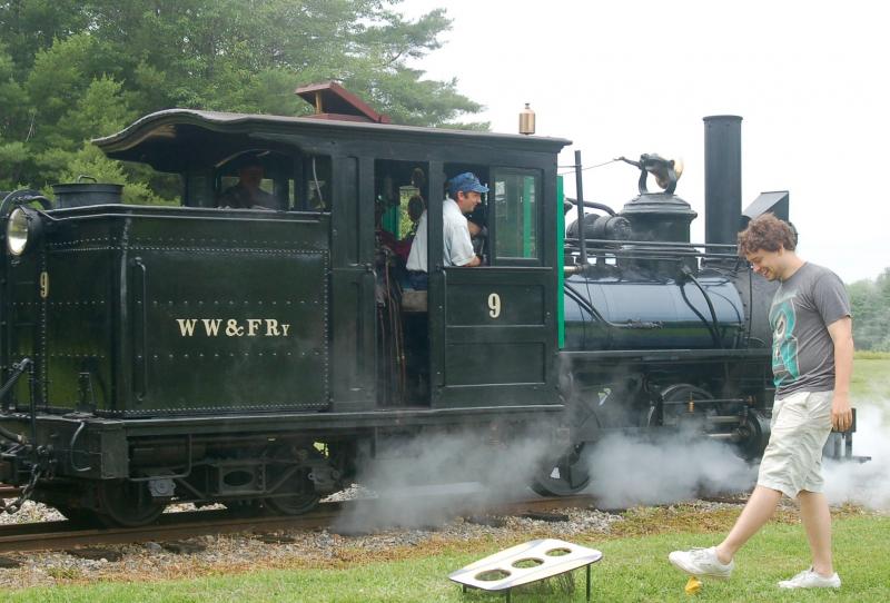 A passenger tosses bean bags while waiting for the arrival of the train. ART MAYERS/Wiscasset Nespaper