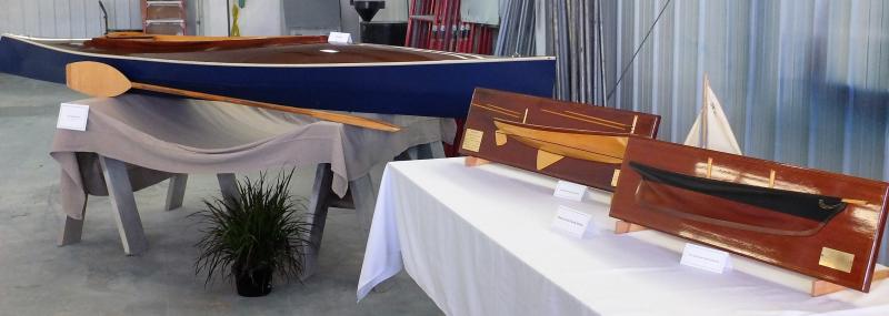 Mounted hull models and a model kayak display at an Arts and Yachts event of the past. LISA KRISTOFF/Boothbay Register
