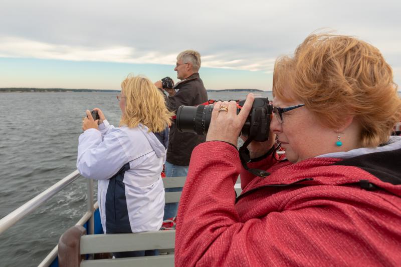 Three of the nearly 20 participants on the Sunrise Photography Cruise. Mike Leonard photo