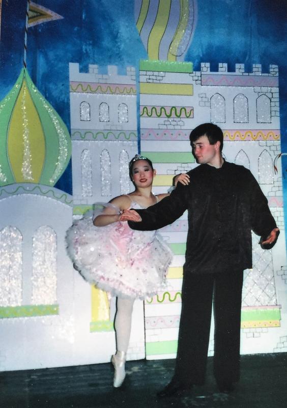 The Sugar Plum Fairy castle in the background (home to the Fairy Caitlin Brackett with Aaron Straw in 2004) will be reconstructed for the Once Upon A Time Family Dance at the Opera House Feb. 8. Courtesy of Susan Brackett
