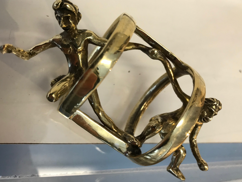 Tony Heyl’s brass “On A Roll” is an example of the A Silver Lining owner’s line of executive toys on exhibit in the 3rd annual “What’s Nude in Boothbay Harbor?” exhibition at Boothbay Region Art Foundation. Courtesy of Mark Coates Tony Heyl