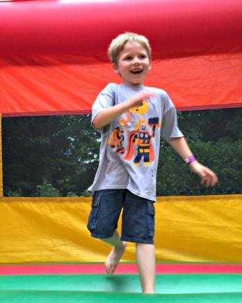 Nathan Perceval has a ball in the bounce house at the Family Fun Carnival on July 24. KATRINA CLARK/Boothbay Register