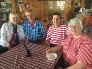 From left, Michelle Wentworth, Sky Wentworth, Clara Wentworth and Gracie Urquhart enjoy Wiscasset Yacht Club’s strawberry shortcake social. SUSAN JOHNS/Wiscasset Newspaper