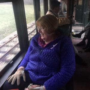Deb Olson rides a train at Wiscasset, Waterville & Farmington Railway Museum in Alna on May 5. SUSAN JOHNS/Wiscasset Newspaper